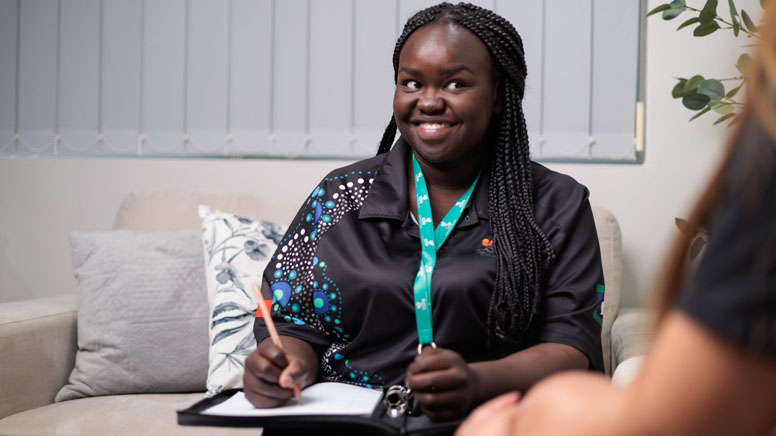 women is happy while writing